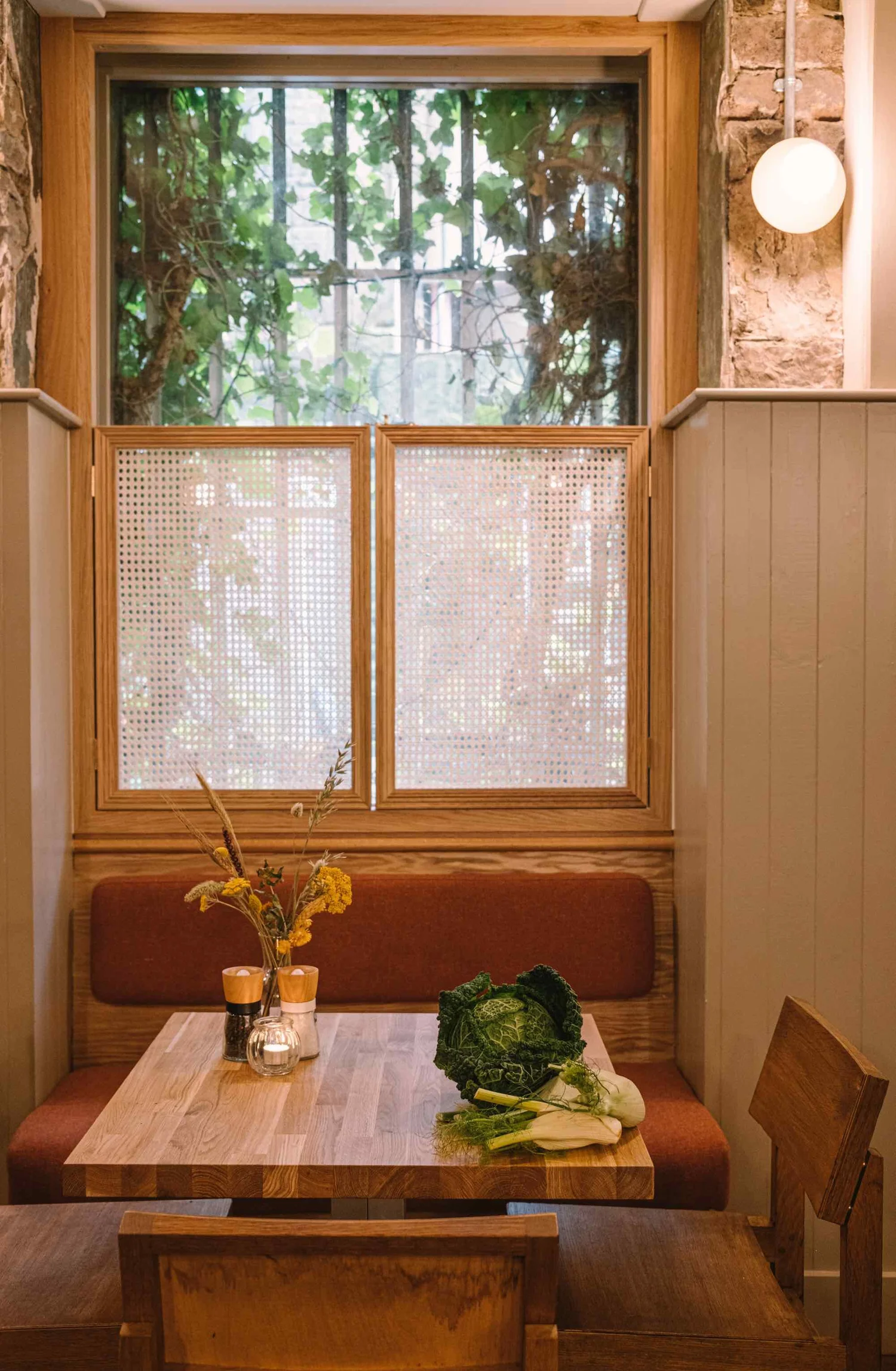 A table laid with seasonal vegetables and shared plates at Hendersons